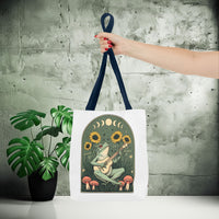 Load image into Gallery viewer, Whimsical Frog Guitarist Tote Bag - Vintage Style Sunflower Mushrooms Moon Phase Design, Music Lover Gift, Boho Chic Shoulder Bag, Nature
