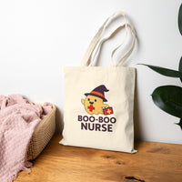 Load image into Gallery viewer, Boo-Boo Nurse Cotton Canvas Tote Bag, Pun Tote, Funny Nurse Gift, Halloween Tote, Bag for Nurses, Cute Nurse Bag, Medical Tote
