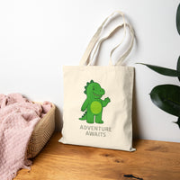 Load image into Gallery viewer, Canvas Tote Bag — Cute Green Dinosaur “Adventure Awaits” Kids Tote
